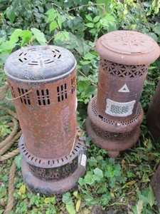 Pair of vintage cast iron Kerosene heaters