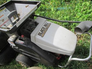 Black Max Grounds Keeper gas powered, with attachments shown unknown functionality 