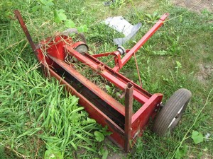 Metal pull behind lawn sweeper