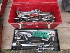 Stack-on tool box with assorted drive ratchets, sockets and other hand tools