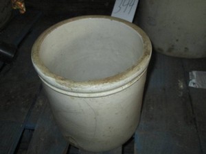 1-gallon unmarked stoneware crock with stress cracks
