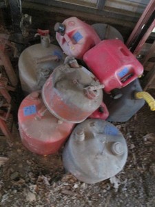 Variety of assorted size and material fuel cans