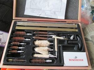 Gun cleaning kit in wood box case