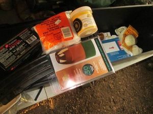 Muzzle loader dry box with gun cleaning supplies and accessories