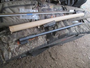 (2) soft side rifle cases, rifle cleaning rods and rifle barrel