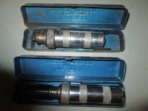 Pair of impact drivers with metal cases