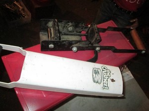 Pair of metal framed can crushers