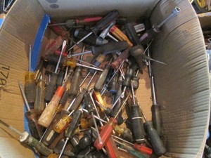 Large supply of assorted screwdrivers and nut drivers