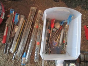 Bin containing a large variety of assorted style and size dlrill bits