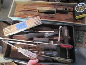 Tool trays with metal files, screwdrivers, nut drivers and other misc