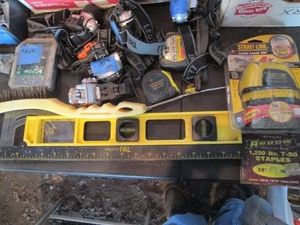 Measuring supplies, miner style head lamps and construction hardware