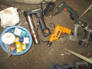 Variety of assorted cordless and electric power tools, misc chargers and batteries may need tlc plus various light bulbs