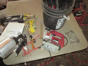 Bucket with jig saws, misc chain and assorted hardware