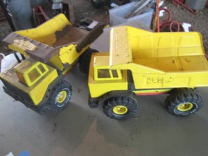 (2) Vintage metal Tonka dump trucks