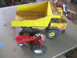 Vintage metal Tonka dump truck and scale replica die cast tractor
