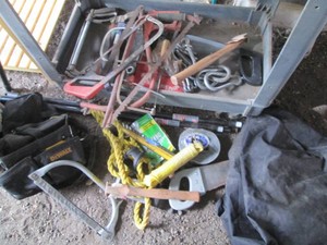Dewalt construction tool belt pouch, variety of assorted hand saws, Duct tape and misc supplies
