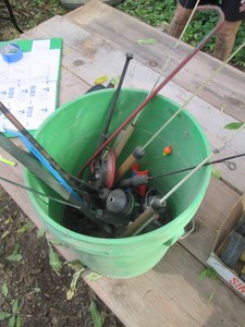 5-gallon pail with misc ice fishing supplies