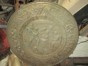 Vintage decorative metal wall plate with pub scene