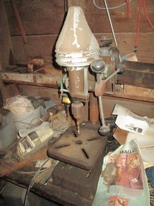 Vintage drill press buyer to bring tools to remove from workbench