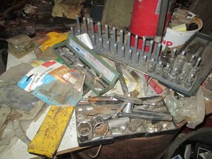Variety of deep and shallow sockets and extensions, vice grips, socket tray organizer, channel lock, cut off wheels and assorted hardware
