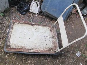 Metal rolling warehouse cart with folding handle