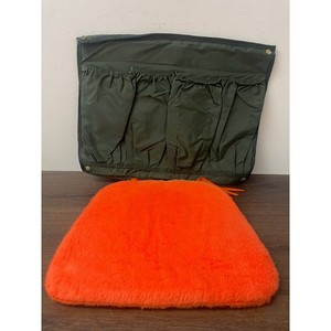 Orange Faux Fur Seat Cushion with Green Storage Panel
