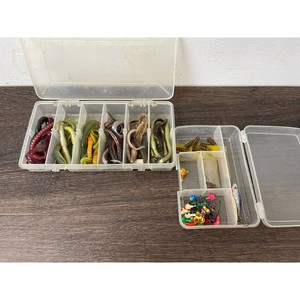 Assorted Soft Plastic Fishing Lures and Jigs in Tackle Boxes