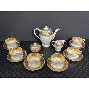 Cream Porcelain Tea Service � Gold Decalment Pattern, 15 Pieces