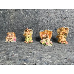 Resin Angel Figurines Set of 4 with Floral Accents
