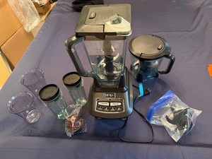 Ninja Blender BL770A30 Includes Attachments Two Bullets, One 9 Cup Pitcher, One 7 Cup Pitcher, Extra Blade and Measuring Cups (Like new)