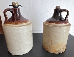 Two Vintage Whiskey Jugs