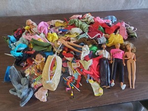 Misc Lot of Dolls Including Ken, Barbie, and others With A lot of Various Clothing and Accessories