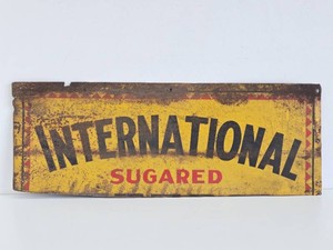 Vintage 1930s era International tin Sign