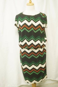 precipitations size 8 green, brown, and white, and black dress