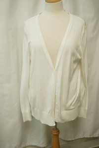 Classic white V-neck cardigan featuring a front button closure