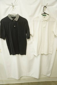 Consensus black 3 button polo with light gray collar size M, Outer banks white 2 button polo size L