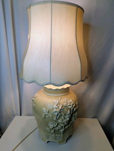 Vintage Chinoiserie table lamp, high-relief floral and branch carvings, pagoda style pale yellow