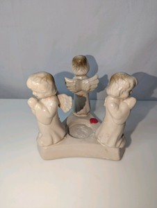 Vintage cherub candle holder