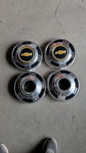 vintage Chevy hubcaps