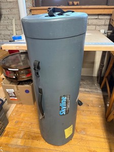 Cylindrical Equipment Carrying Case With Electrical Cords