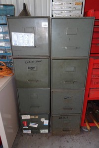 2 Metal Storage Cabinets and Contents - Oil Filters, Chain Saw Chains