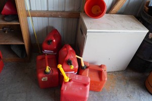 Gas Cans, Funnels and File Cabinet