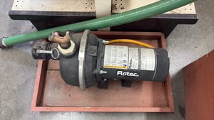 1 HP Flotec Lawn pump with housing and suction hose with suction screen