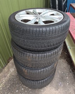 Lot of 4 used Audi tires and rims . 24540 R 18