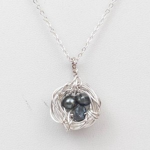 Wire-Wrapped Nest Pendant Necklace With Dark Beads