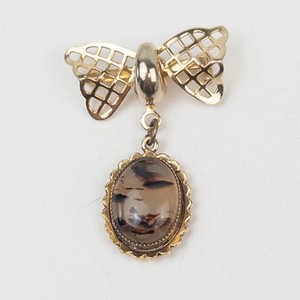 Gold-Tone Butterfly Bow Brooch With Oval Stone Pendant