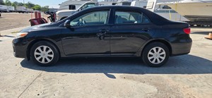 2011 Toyota Corolla - black, 170,851 miles