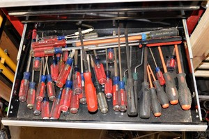 Drawer Full of Flat-Head Screwdrivers