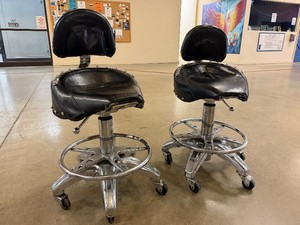Pair of Vintage Genuine Motorcycle Seat Rolling Swivel Chairs