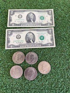 5 Ike Dollars & 2 $2 Bills